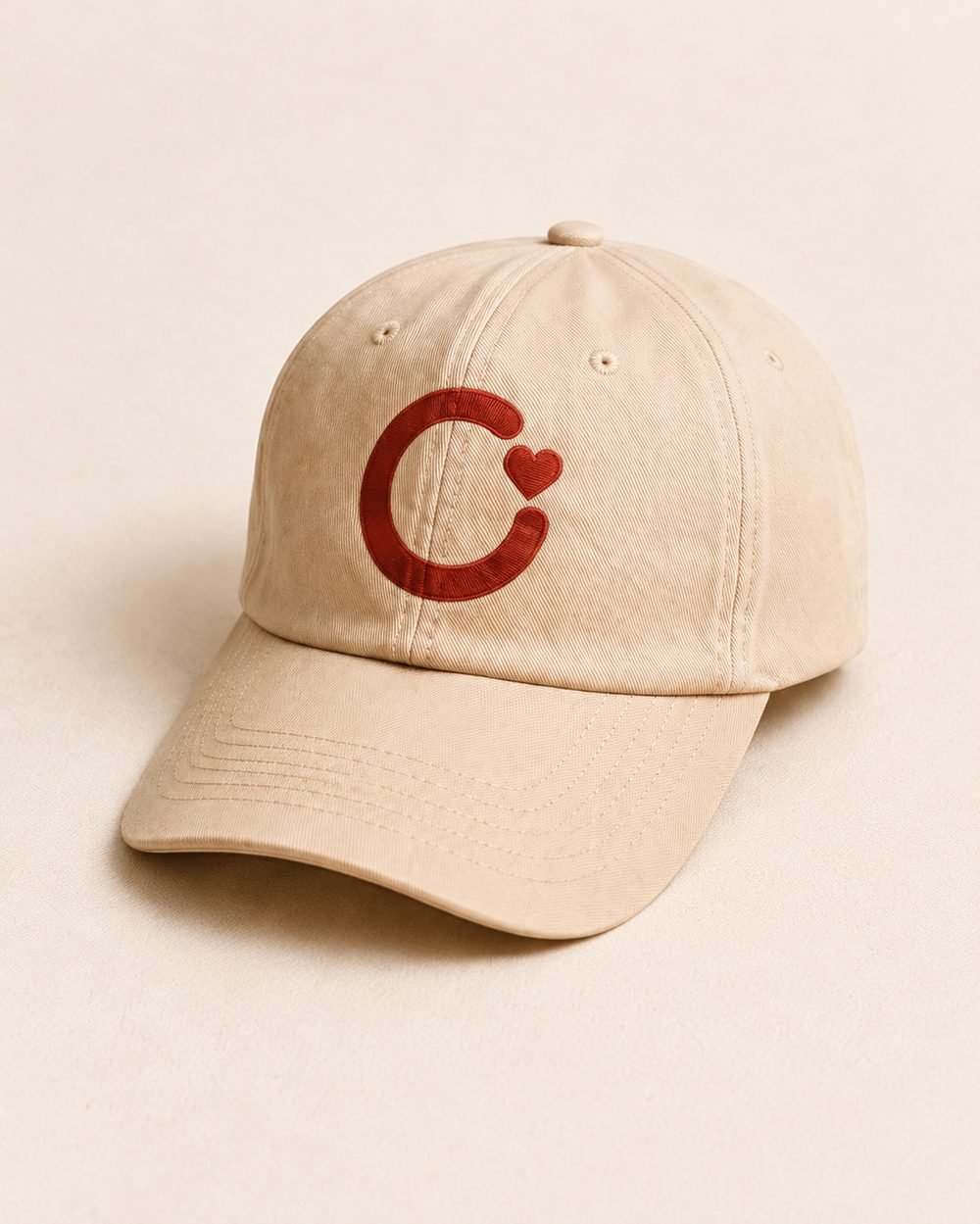 Cap met Open-symbool en hartje